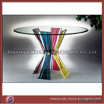 Transparent round acrylic/perspex table with bunchy legs